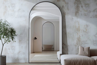 The Titan Arched Full-Length Mirror (180x80) sits elegantly in the lounge, making the room feel larger and brighter | C&F Creation