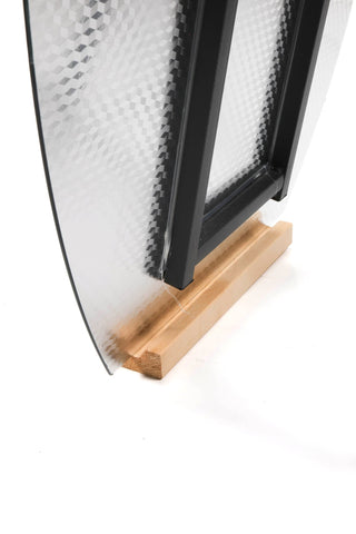 A close-up shot of the wooden base supporting the Cascade Irregular Frameless Full-Length Freestanding Mirror, showing the back structure and stand.