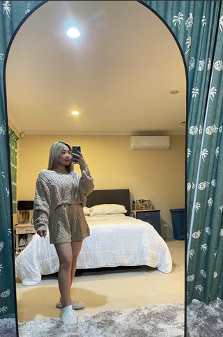 Customer Rhem stands in front of her Titan Arched Full-Length Mirror, capturing a reflection in her cozy, well-decorated bedroom. The mirror’s elegant arched design and full-length frame add a stylish touch to the room, perfectly reflecting her outfit and surroundings.