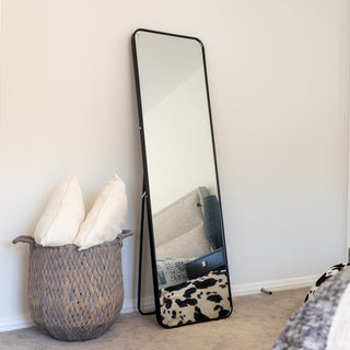 The Lithe X Full-Length Mirror (155x45cm) with a slim black aluminium alloy frame, freestanding with a sturdy back stand. A stylish and functional addition for bedrooms, dressing areas, and entryways. | C&F Creation