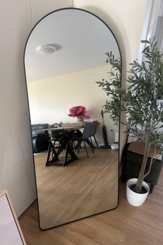 Customer review by Lania Wahapu for the Svelte Arched Full-Length Mirror. Praising the mirror’s better appearance in person, quick delivery, and exceptional service. Delivered and set up as it was heavy.