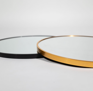 Detailed side view of Valor Round Wall Mirrors with minimalist black and brushed gold aluminium alloy frames, showcasing fine craftsmanship and modern style | C&F Creation