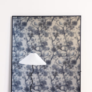 Close-up view of the corner on the Zenith X full-length mirror, featuring a sharp black aluminium frame and distortion-free reflection.