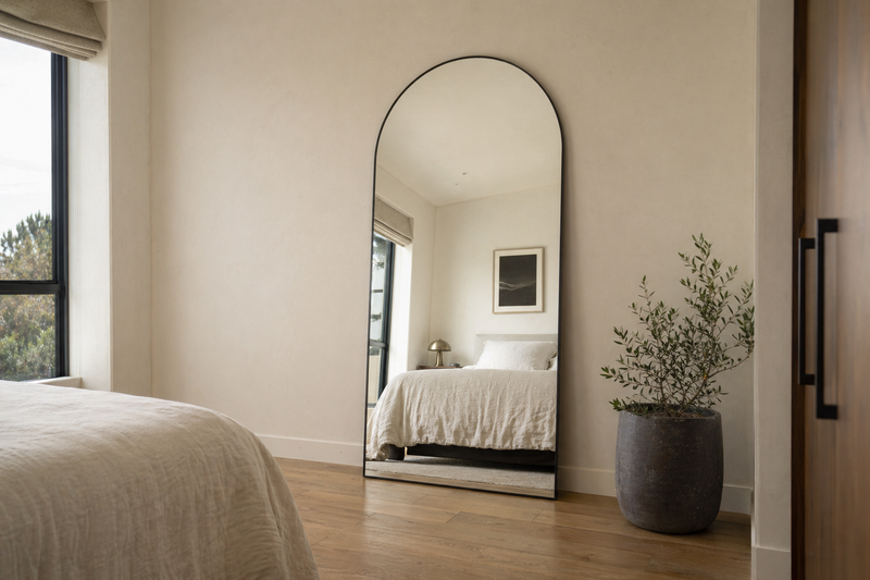 Floor mirror NZ — 180cm matte black arched leaning floor mirror in a NZ bedroom