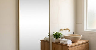 Mirror cleaning guide NZ - bathroom vanity with full length mirror, clean towels and plant