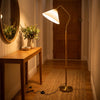 Aurelia Pleated Fabric Floor Lamp adding a warm welcome beside a console table in an entryway