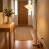 Aurelia Pleated Fabric Floor Lamp adding a warm welcome beside a console table in an entryway