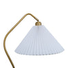 Side profile of the Aurelia Pleated Fabric Floor Lamp tapered pleated shade hanging from the curved brass arm, white background