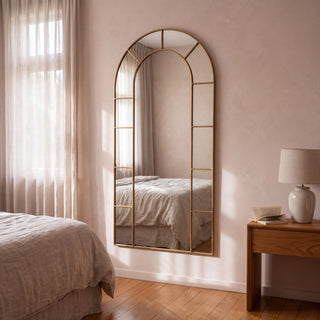 Bastia Aurelia antique gold arched window full length mirror 200 x 100cm in a soft pink bedroom in morning light