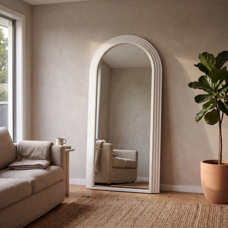 Fontenay Stepped Arch Full-Length Mirror | 200 x 100cm - 01 Living Room, leaning against a limewash wall