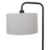 Marceau Linen Drum Floor Lamp side detail of the linen drum shade hanging from the curved matte black frame on white background