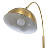 Angled close up of the Orsay Gold Arc Floor Lamp shade, gold arc and reeded stem detail