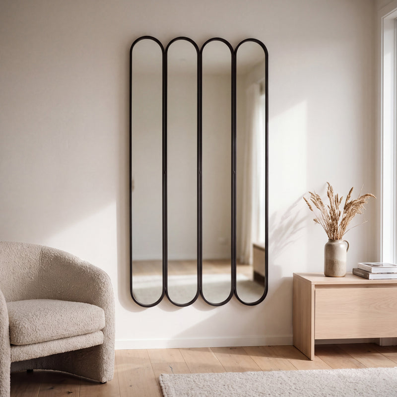 Ravel quad oval black cast iron full length mirror 200 x 100cm hanging on a living room wall