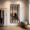Ravel quad oval black cast iron full length mirror 200 x 100cm in a boutique fitting corner