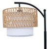 Rousseau Rattan Weave Floor Lamp close up of the rattan style weave detail where the shade hangs from the arched arm