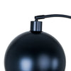 Close up of the Saturne Black Globe Arc Floor Lamp globe shade where it meets the arc