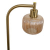 Angled close up of the Solara Fluted Lantern Floor Lamp lantern style glass shade and brass lamp holder on white background