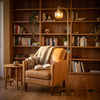 Solara Fluted Lantern Floor Lamp lighting a comfortable armchair in a quiet reading corner