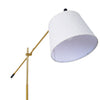 Close up of the Vienna Brass Marble Base Floor Lamp tapered oatmeal linen shade and brass arm