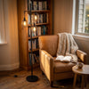 Voltaire 3-Light Cage Floor Lamp lighting a quiet reading corner beside an armchair