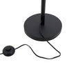 Round matte black base and inline foot switch of the Voltaire 3-Light Cage Floor Lamp on white background