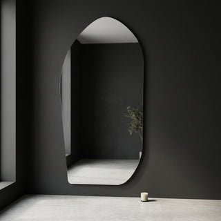 C&F Creation Cascade X Irregular Frameless Full Length Mirror 200x100cm mounted on dark charcoal textured wall in modern NZ living space
