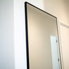 A detailed view of the edge design of the Facet full-length wall mirror 170x70cm, highlighting its minimalist craftsmanship.