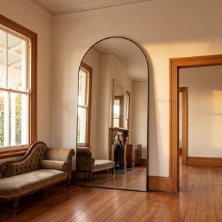 C&F Creation Louis Arched Full Length Mirror 220x120cm leaning in villa living room creating dramatic focal point