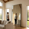 C&F Creation Lowen X Rectangular Full Length Mirror 220x120cm leaning in living room alternate angle with person