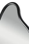 Close-up detail of the curved top edge of the Nova Irregular Full-Length Mirror with a sleek black frame