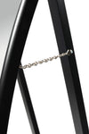 Close-up view of the chain support on the back of the Nova Irregular Full-Length Mirror with a black frame
