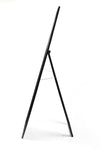 Side view of the Nova Irregular Full-Length Mirror showcasing its sleek black frame and chain-supported stand
