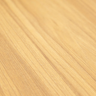 Close-up of the oak wood grain texture on the Reede Tallboy 5-Drawer surface, showing the smooth finish and natural warm tones.