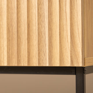 Close-up detail of the Reede Tallboy 5-Drawer dresser in oak finish, highlighting the vertical fluted drawer design and sturdy black metal base for modern stability and style.