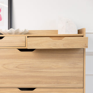 Close-up of the Risa Slim Shoe Cabinet in oak finish with the top drawer open, showing handle cut-out design and smooth sliding function.