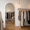 C&F Creation Titan Alba Arched Full Length Mirror 180x80cm wall mounted in boutique retail setting