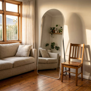 C&F Creation Titan Alba Arched Full Length Mirror 180x80cm freestanding in living room showing full length reflection