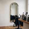 C&F Creation Titan Arched Full Length Mirror 180x80cm wall mounted in hair salon showing full length reflection