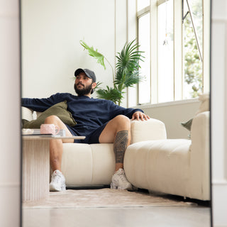 Close-up view showing the Titan X arched full-length mirror’s distortion-free reflection, capturing a clear and natural image of the living space. The 4mm high-definition glass offers superior clarity, perfectly balancing modern design and functionality for contemporary New Zealand homes.