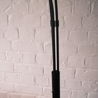 Close-up of the main support pole showing the quality assembly. Illustrates how the individual arm cables neatly feed into the central tube. Highlights the smooth metal joinery and durable construction standards.